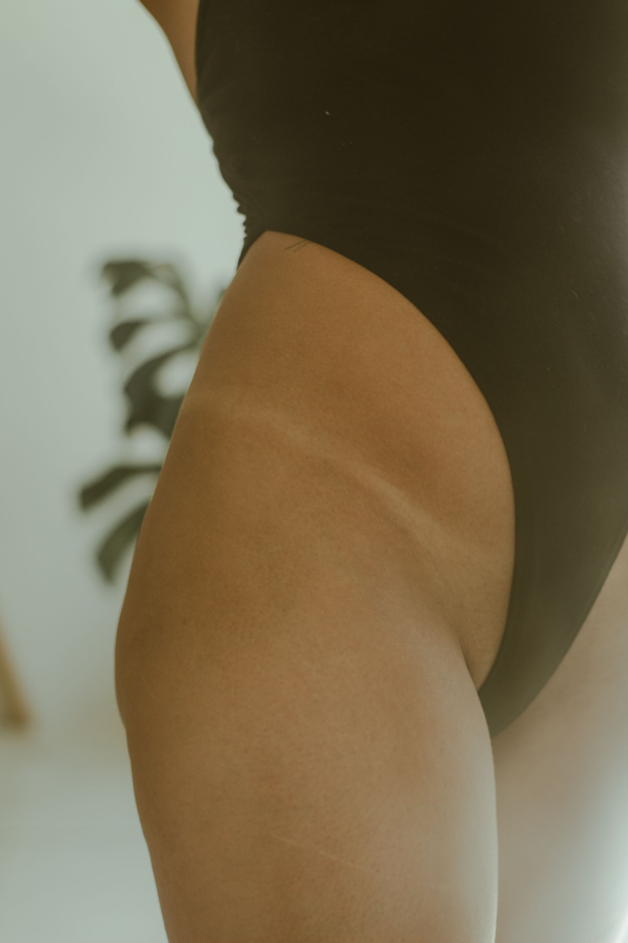 Sun-kissed, even airbrush spray tan result at Glo Haus